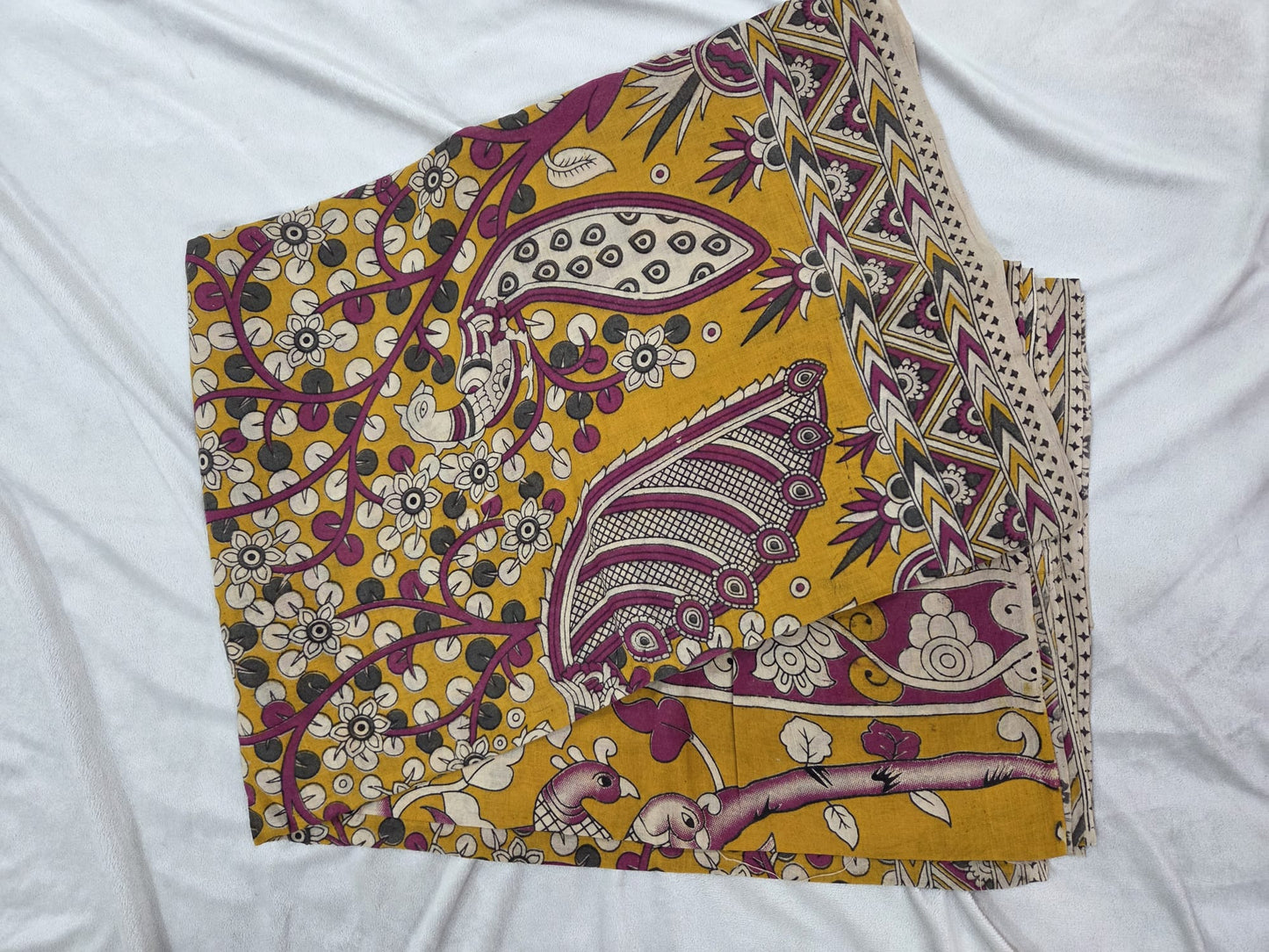 Kalamkari saree with stylized trees, animals (like elephants)